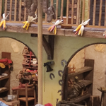 Immagine: le botteghe del calzolaio e del fabbro